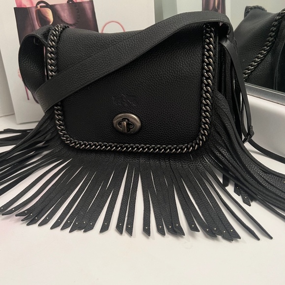 Black Dakotah fringed textured-leather shoulder bag | Coach | Bags, Boho  leather bags, Shoulder bag